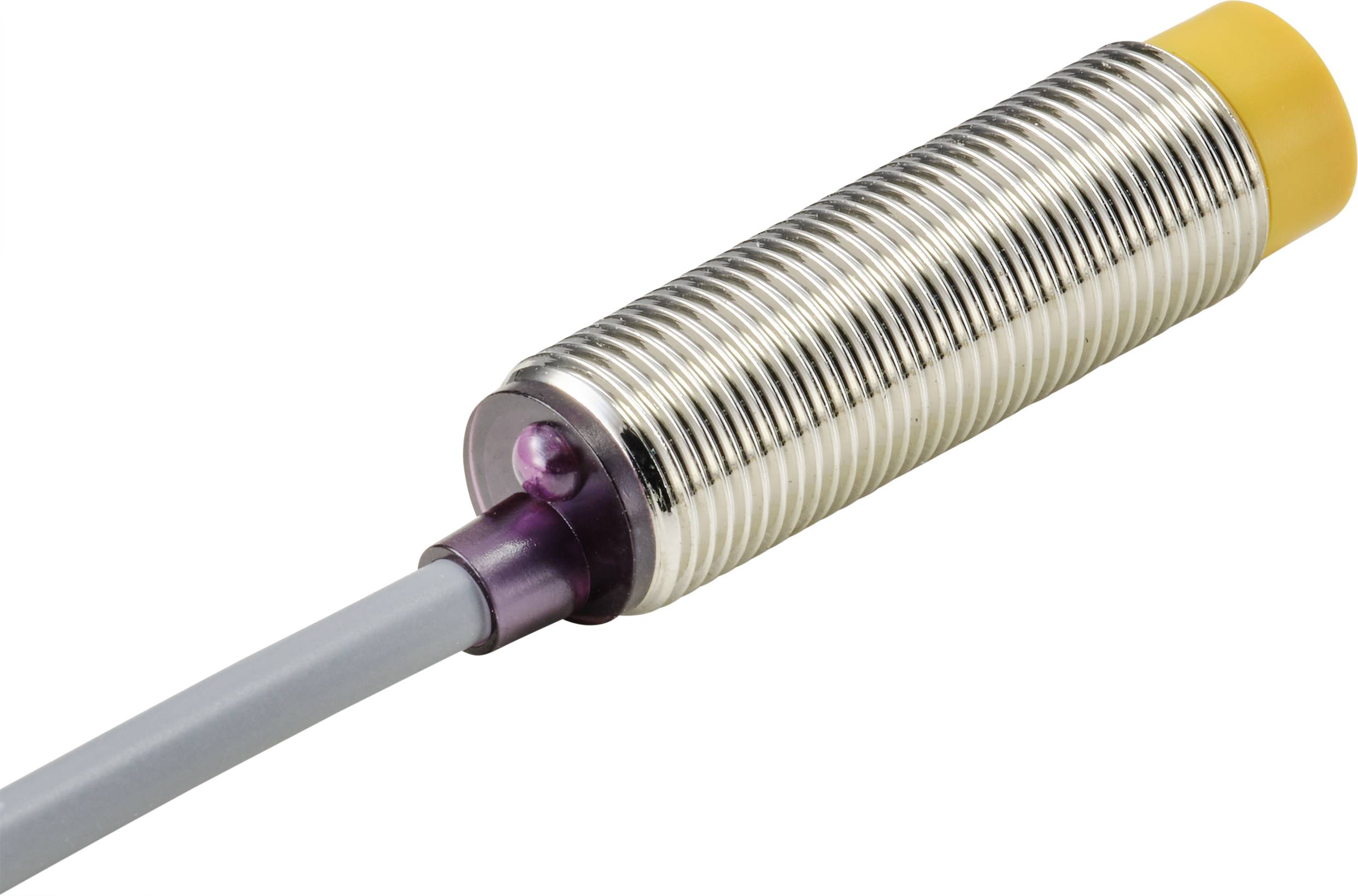 Válcový indukční senzor s vroubkovaným kovovým pouzdrem a žlutým krytem. Kabel připojen z jedné strany.