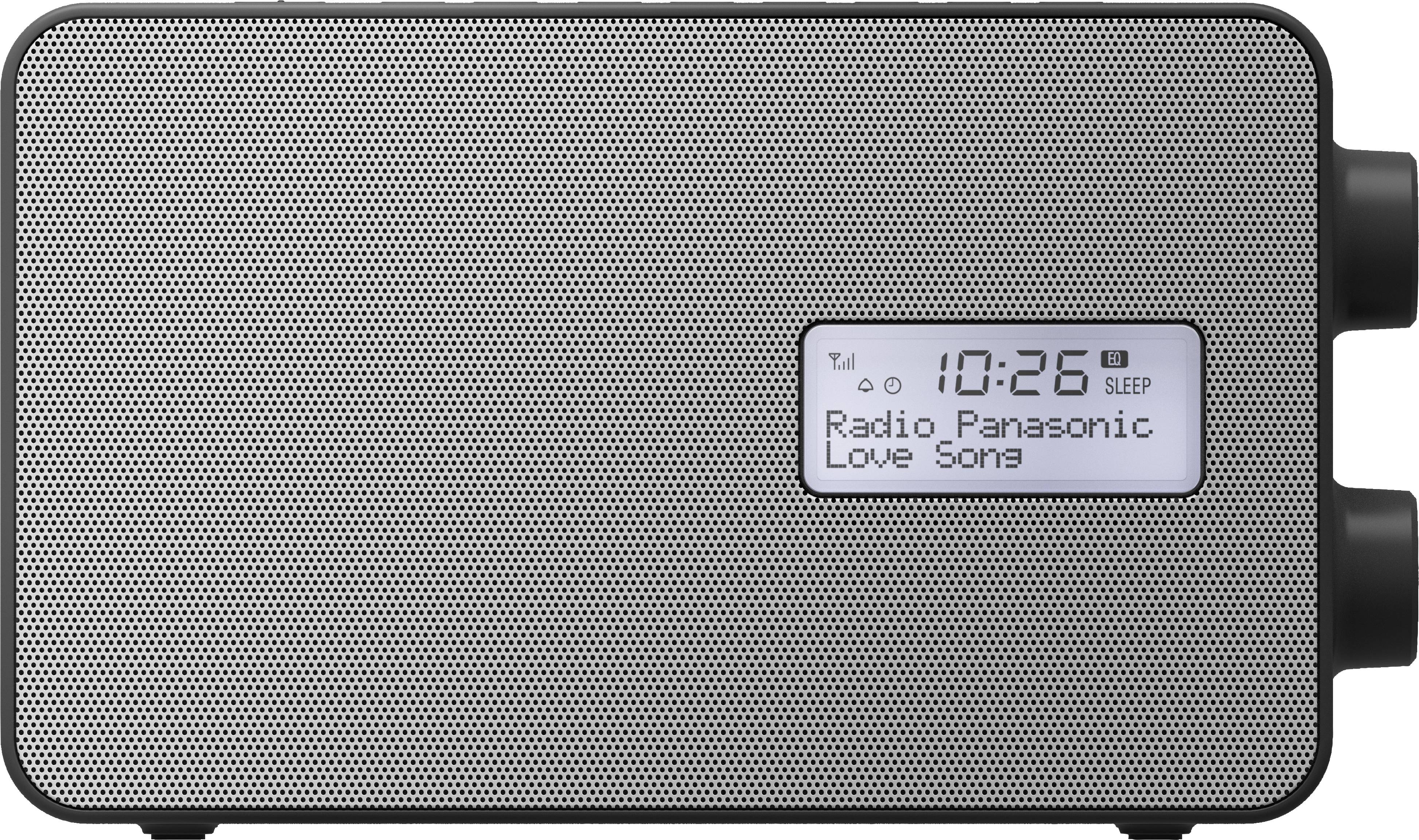 Digitální rádio s šedým tělem a malým displejem, zobrazuje čas '10:26' a hraje 'Radio Panasonic Love Song'.