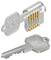 Ilustrace znázorňující průřez zámku a klíče. Zámek odhaluje vnitřní kolíky vyrovnané se vzorem klíče, což ilustruje, jak klíč zámek ovládá.