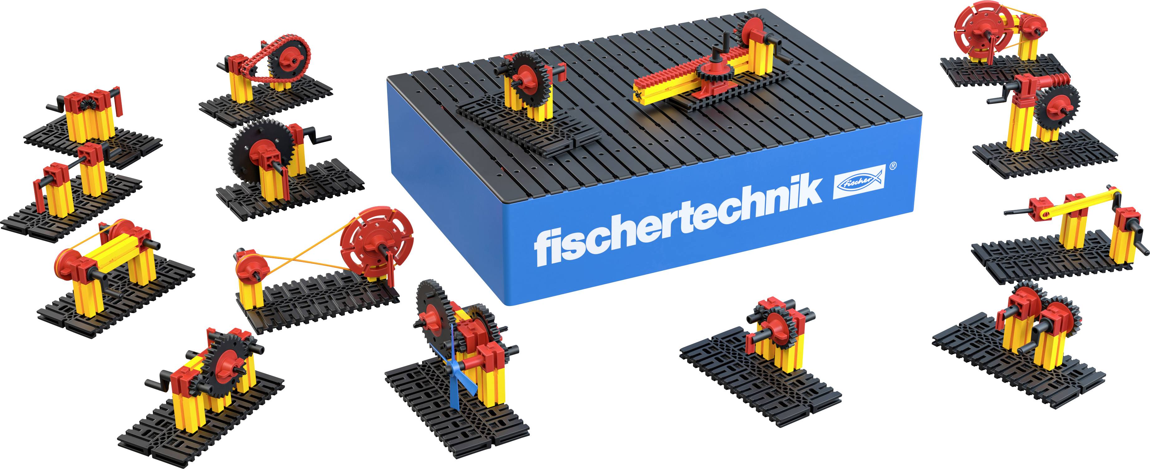 Stavebnice 'Fischertechnik Plus Dynamic' s různými mechanickými modely, které předvádějí techniku pohonu a principy pohybu.