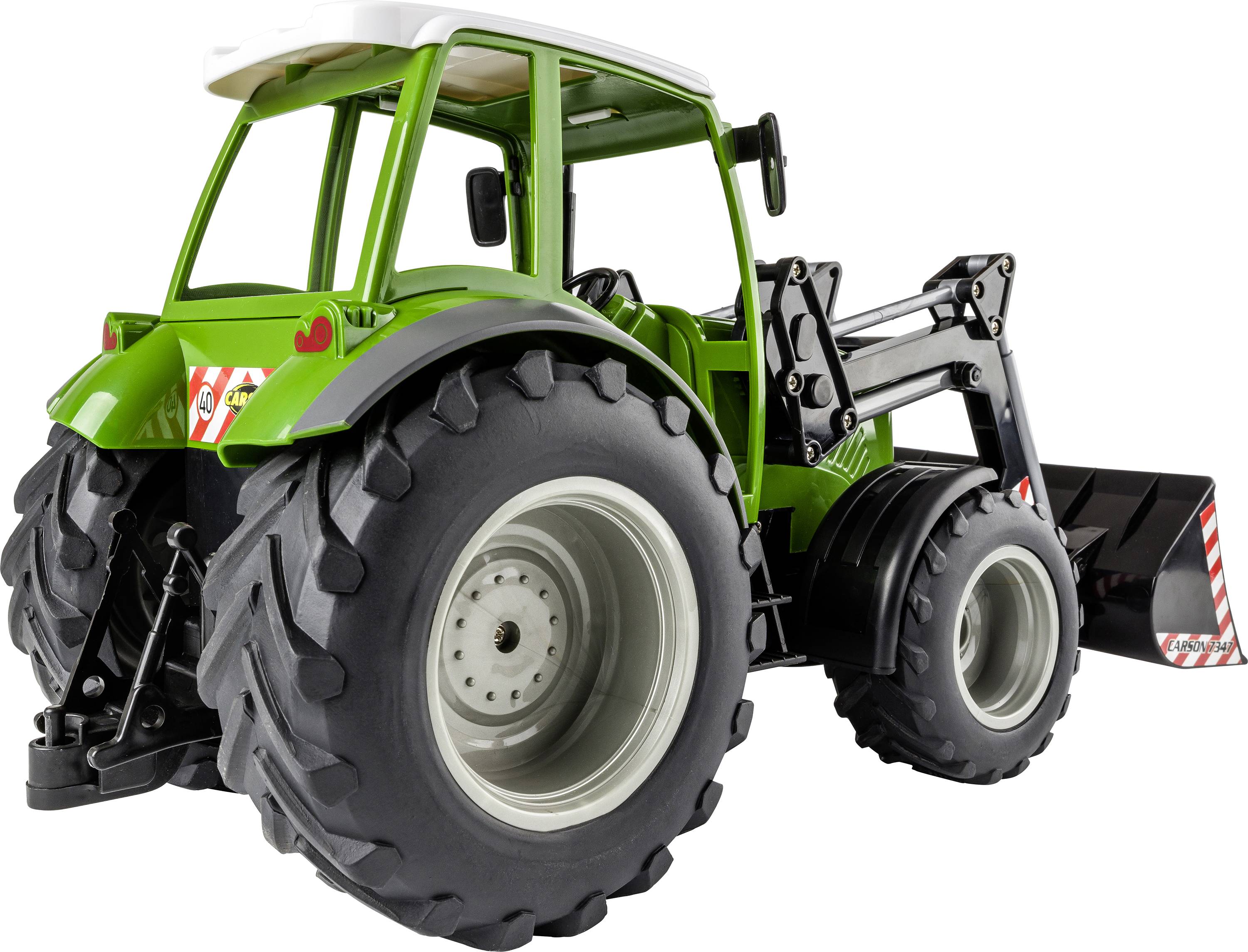 Zelený hračkářský traktor s velkými koly a předním nakladačem. Ideální pro děti při rolových hrách na farmě.