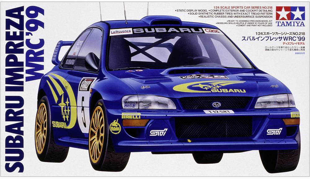 'Model auta Subaru Impreza WRC '99 od Tamiye v modré barvě se žlutými detaily, zobrazený na kartónové krabici.'