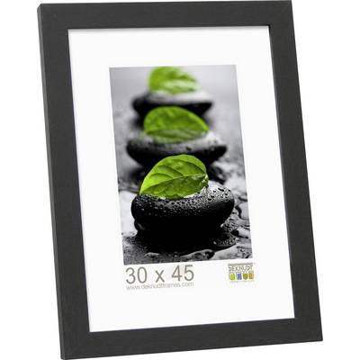 Černý fotorámečk s fotografií hladkých kamenů s zelenými listy. Rozměry: 30 x 45 cm.