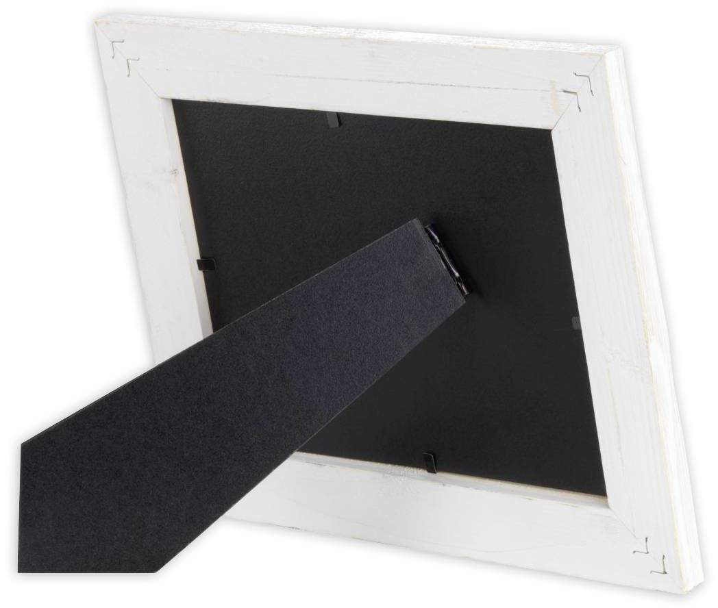 Zadní strana obrazového rámu s černou podpěrnou konzolí pro umístění na povrch. Rám je vyroben z světlého dřeva.