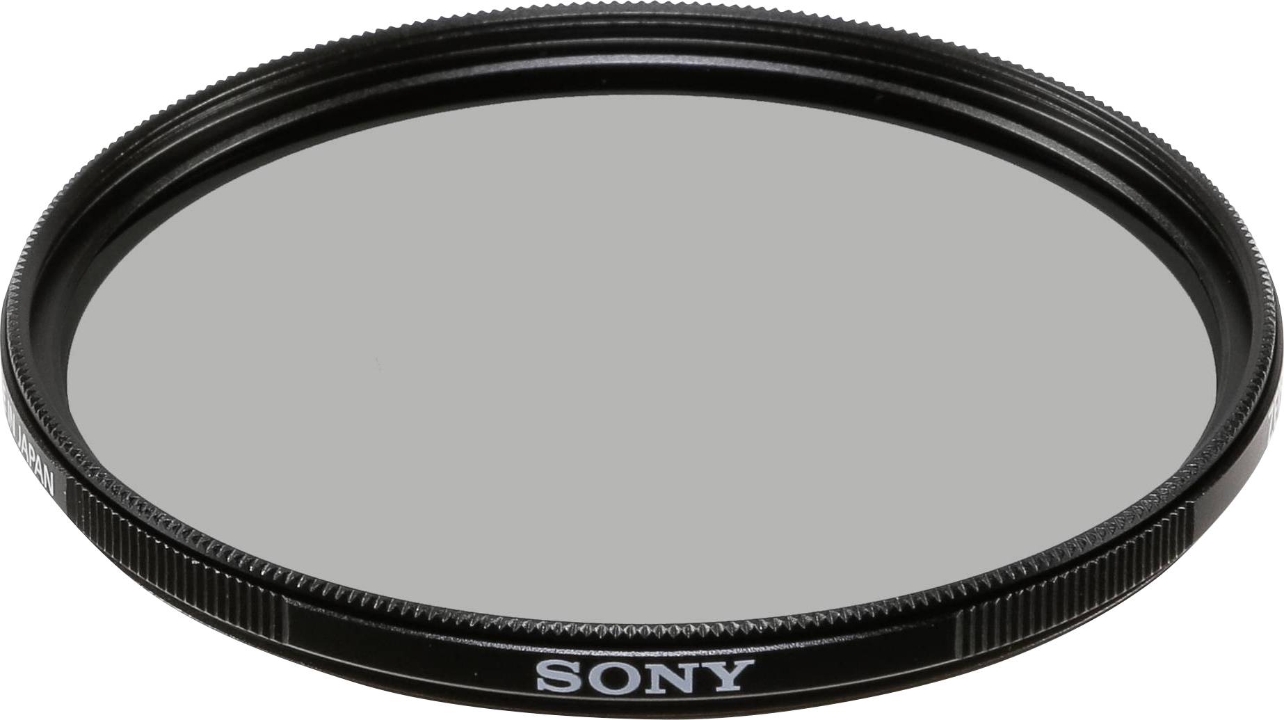Kulatý fotografický filtr od Sony, černě lemovaný, ležící na rovném povrchu.