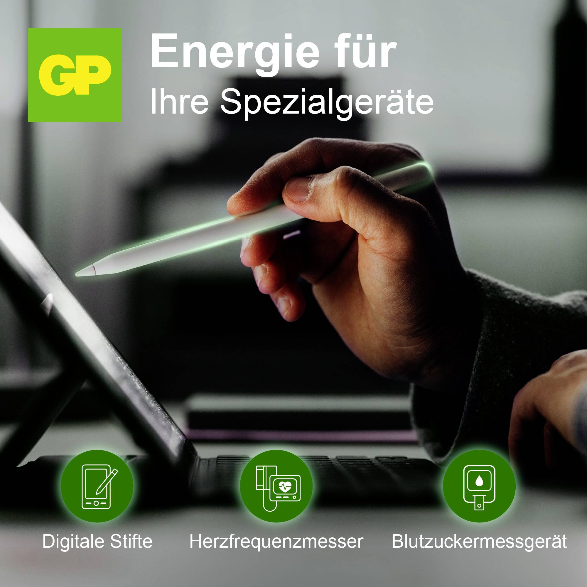 Reklamní grafika pro GP: Ruka drží digitální pero nad notebookem; text „Energie pro vaše speciální přístroje" a symboly pro digitální pero, měřič srdeční frekvence a glukometr.