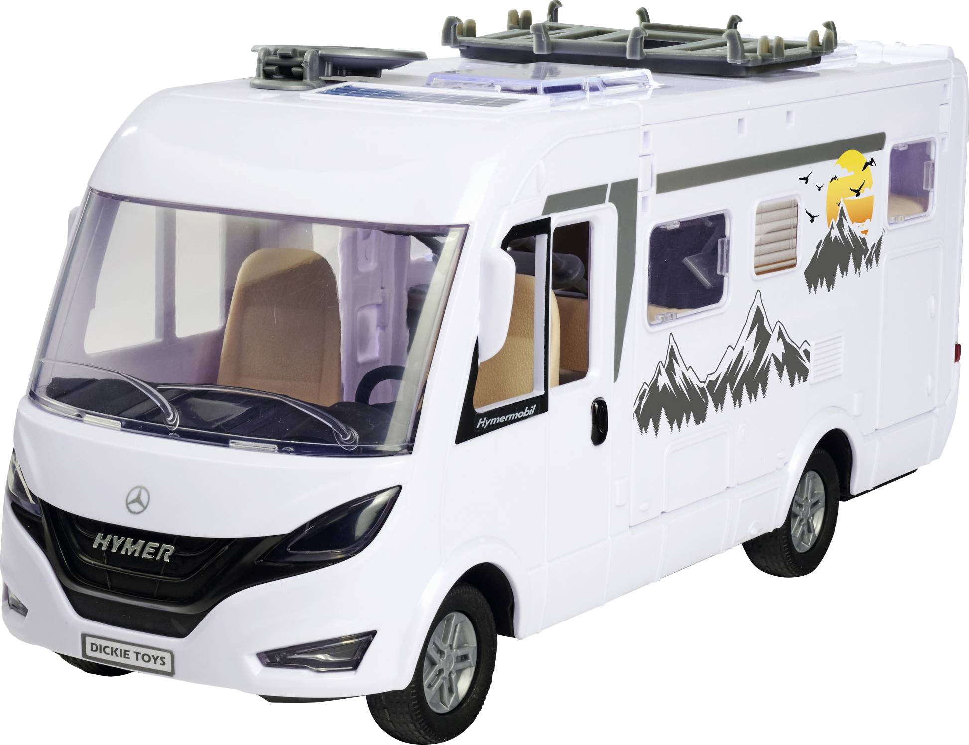 Hračkářský karavan z plastu s nálepkami hor a východu slunce na boku; bílý model s černými detaily.