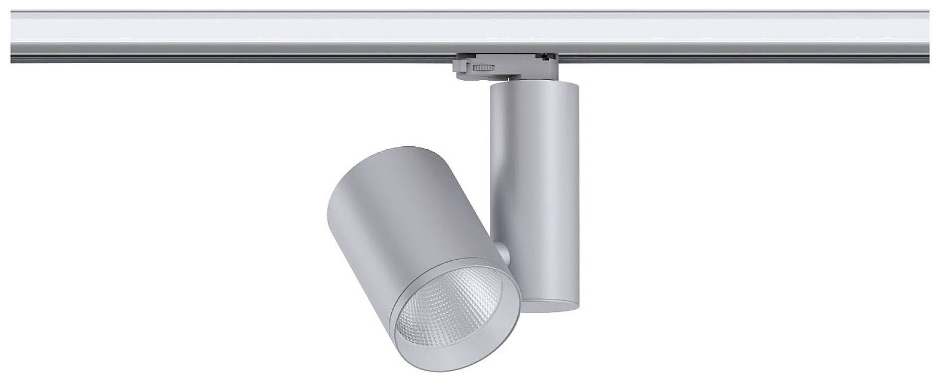 Stropní bodové světlo z kovu, namontované na kolejnici. Moderní design, válcovitý tvar svítidla, stříbrná barva.