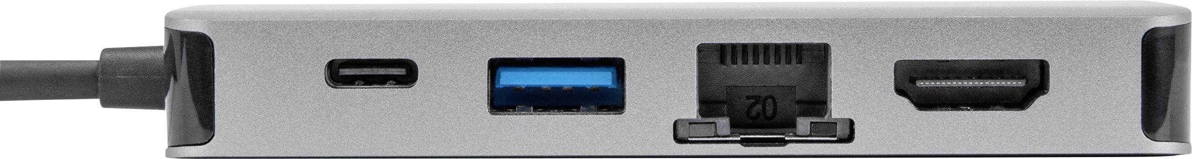 Multifunkční adaptér s konektory: USB-C, USB 3.0, Ethernet a HDMI, vhodný pro připojení několika zařízení k počítači.