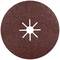 Kulatý, červenohnědý brusný kotouč s hvězdicovitým vzorem uprostřed, používaný pro broušení kovů nebo dřeva.