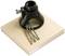 Nástavec kruhovače s vrtáky na dřevěné desce.