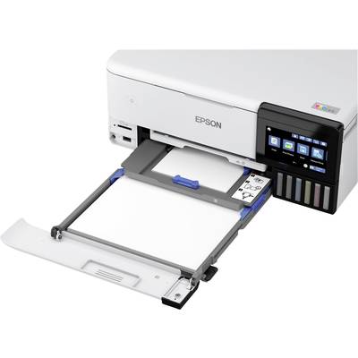 Moderní bílá tiskárna Epson s otevřeným podavačem papíru a barevnými inkoustovými nádobkami vpravo. Digitální displej zobrazuje možnosti.