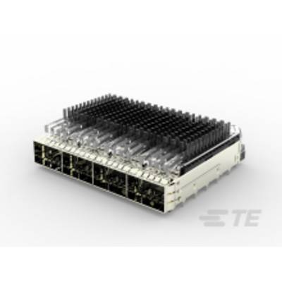 Stříbrný elektronický síťový switch s osmi porty a velkým chladičem pro odvod tepla na horní straně.