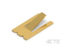 Zlatý, abstraktní objekt ve tvaru písmene 'E', který leží na bílém povrchu.