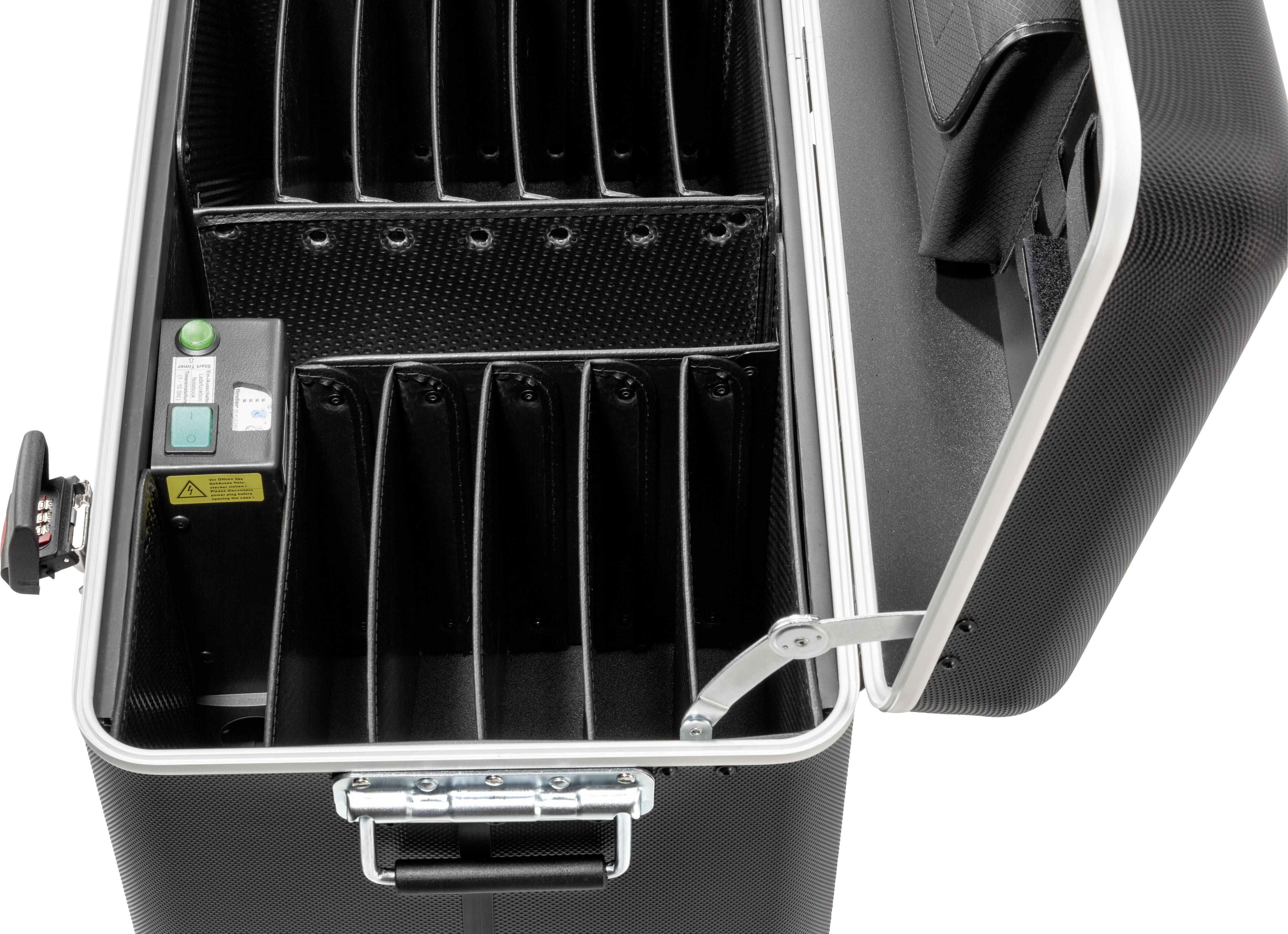 Otevřený, prázdný kufřík s přihrádkami, vhodný pro uskladnění několika zařízení. Na levé straně jsou umístěny ovládací spínače.