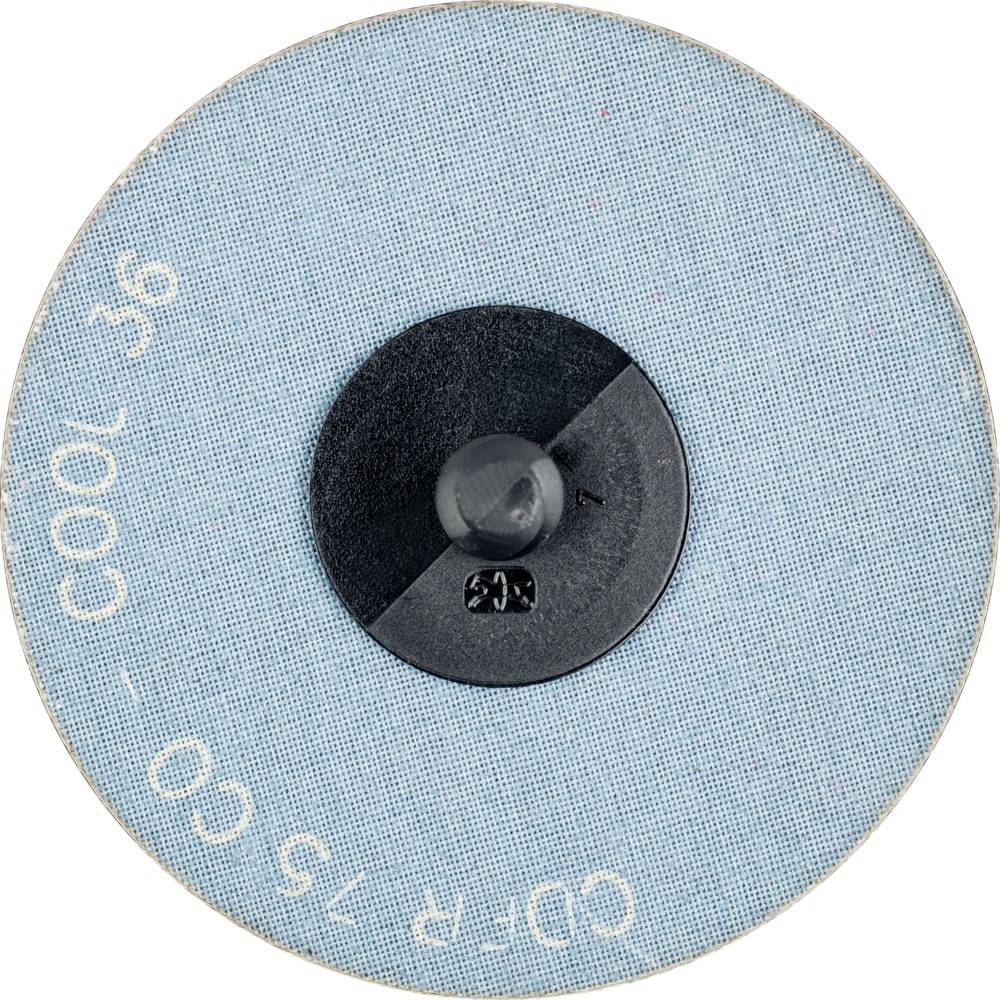 Brusný kotouč s modrým povrchem a černým středem, štítek zobrazuje zrnitost a specifikace.