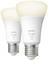 Dvě LED žárovky Philips Hue s paticí E27, které svítí teplým bílým světlem, vhodné pro inteligentní ovládání osvětlení prostřednictvím mobilní aplikace.