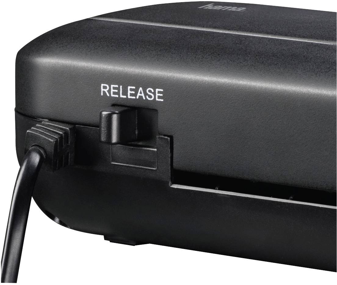 Detailní záběr ukazuje černou skartovačku s kabelem vlevo a tlačítkem "RELEASE" na horní straně.