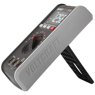 Digitální multimetr od Voltcraftu ukazuje 12,3 voltů. Stojan a přepínač měřicích módů jsou viditelné. Prostor pro měření napětí, odporu a proudu.