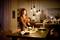 Žena prostírá stůl v útulně osvětlené jídelně. V pozadí stojí další osoba v kuchyni.