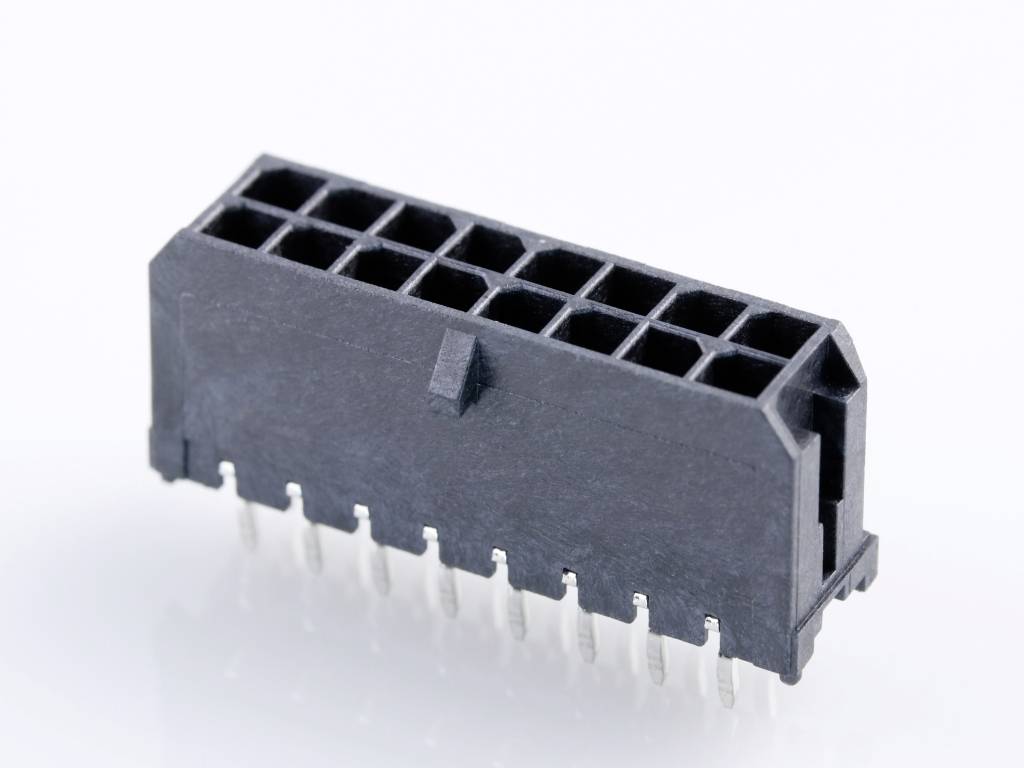 Černý, obdélníkový elektronický konektor s několika kolíky, používaný pro propojení kabelů na desce plošných spojů.