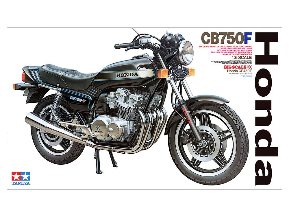 Model motocyklu Honda CB750F od Tamiya. Černý design se stříbrným motorem a výfukem. Text: 'Honda CB750F'. Měřítko 1:6.