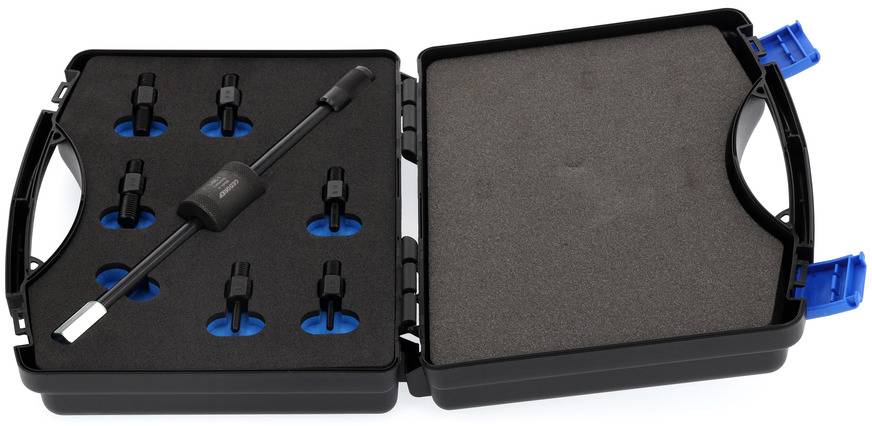 'Černý kufřík s pěnovou výplní, který obsahuje devět pozic a dlouhý kabel s adaptérem.'