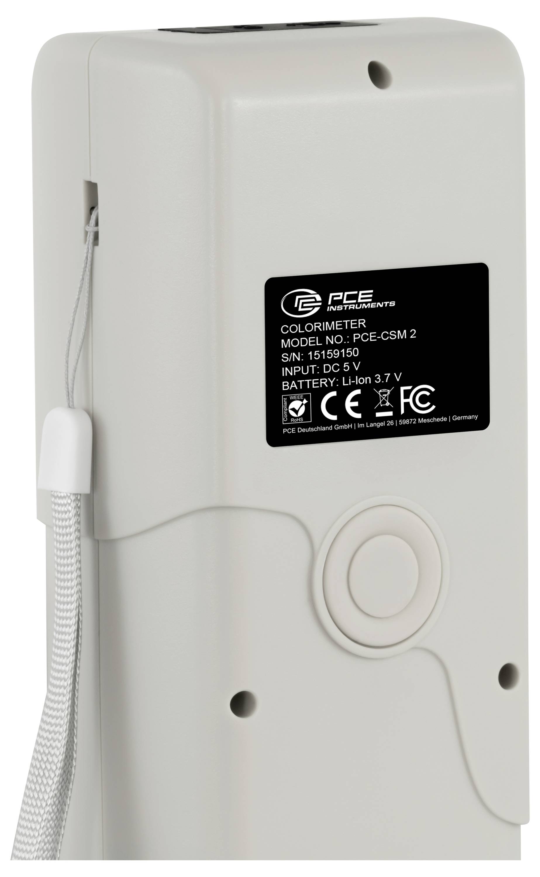 Zadní pohled na bílý colorimetr PCE s páskem na zápěstí a kulatým tlačítkem; štítek ukazuje model PCE-CSM 2, vstup 5V 1A, baterie Li-ion 3,7V.