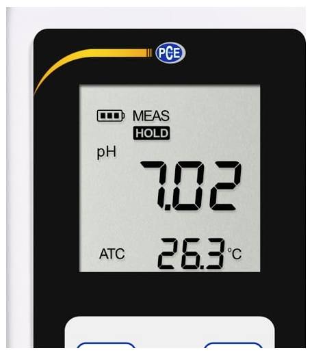 Digitální displej pH metru zobrazuje pH 7,02 s funkcí „MEAS HOLD" a teplotu 26,3°C, což naznačuje probíhající měření.