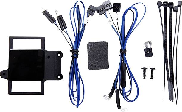 Elektronický příslušenský set s kabely, spínači a upevňovacími prvky pro technické instalace.