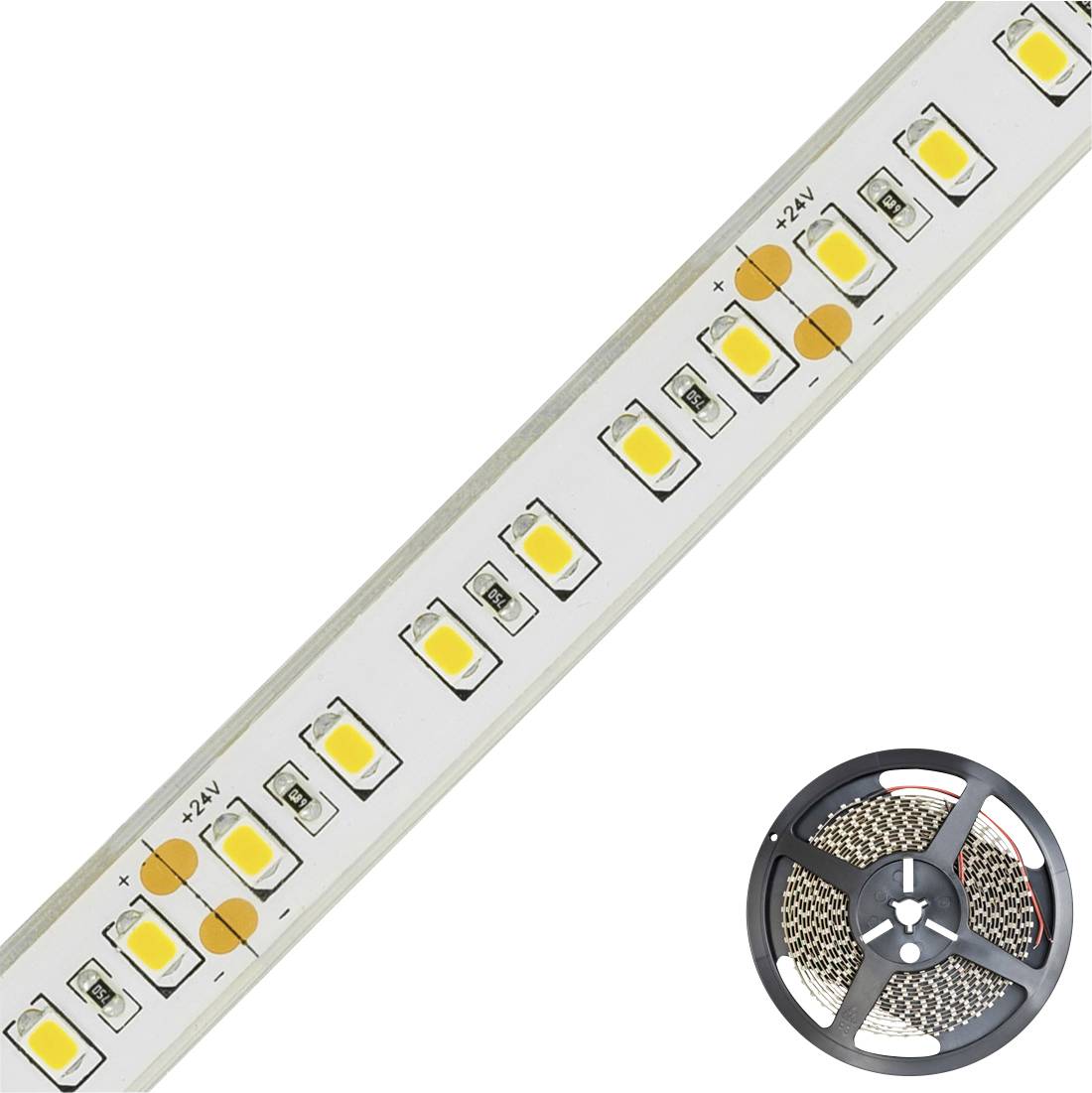 LED pásek se žlutými LED diodami a značkami plus/minus. Dole vpravo je vidět svinutá role LED pásku.