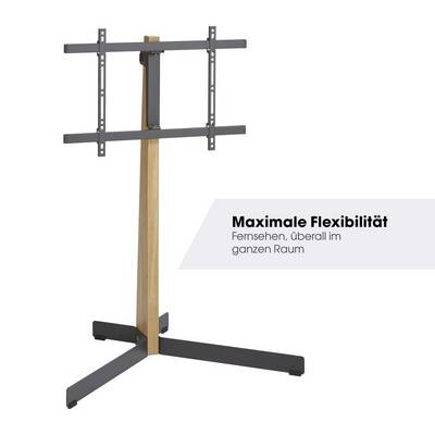Dřevěný a kovový stojan na TV s minimalistickým designem. Text uvádí: 'Maximální flexibilita – sledování televize kdekoliv v prostoru'.