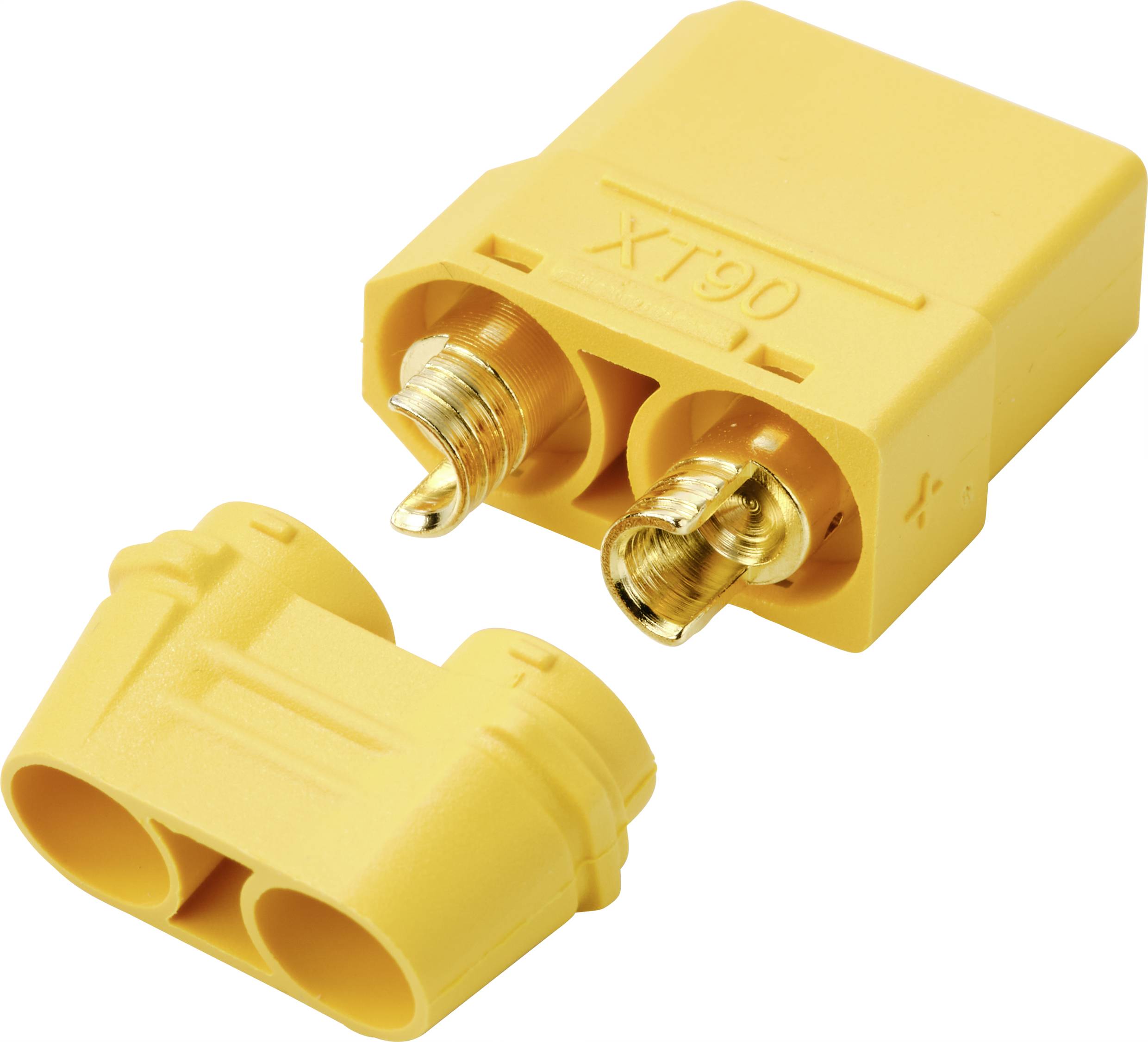 Žlutý konektor a zásuvka XT90 z plastu a kovu, používané k bezpečnému propojení elektronických komponent.