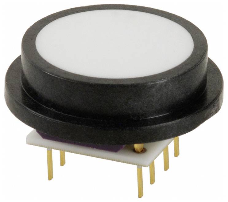 Malý obdélníkový černý mikrospínač s červeným tlačítkem na horní straně, označený '11SM701-T' a 'MICRO', používaný pro elektronické součástky.