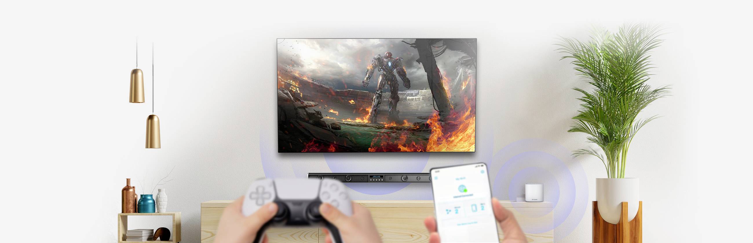 Osoba hraje videohru na velkém televízoru; ovladač v ruce a smartphone, který hru streamuje; moderní obývací pokoj.