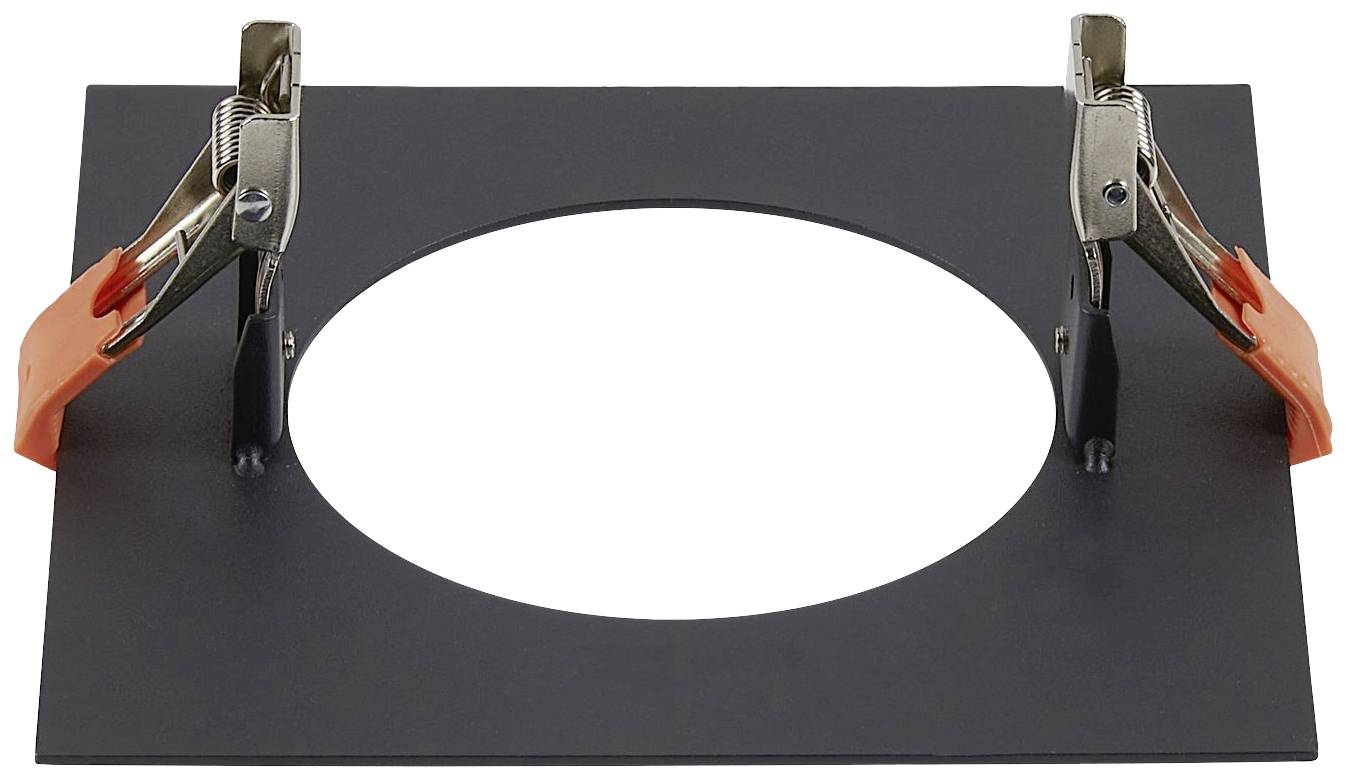 Černá kovová deska s kruhovým výřezem uprostřed. Na každé straně jsou připevněny dvě stříbrné svorky s oranžovými úchyty.