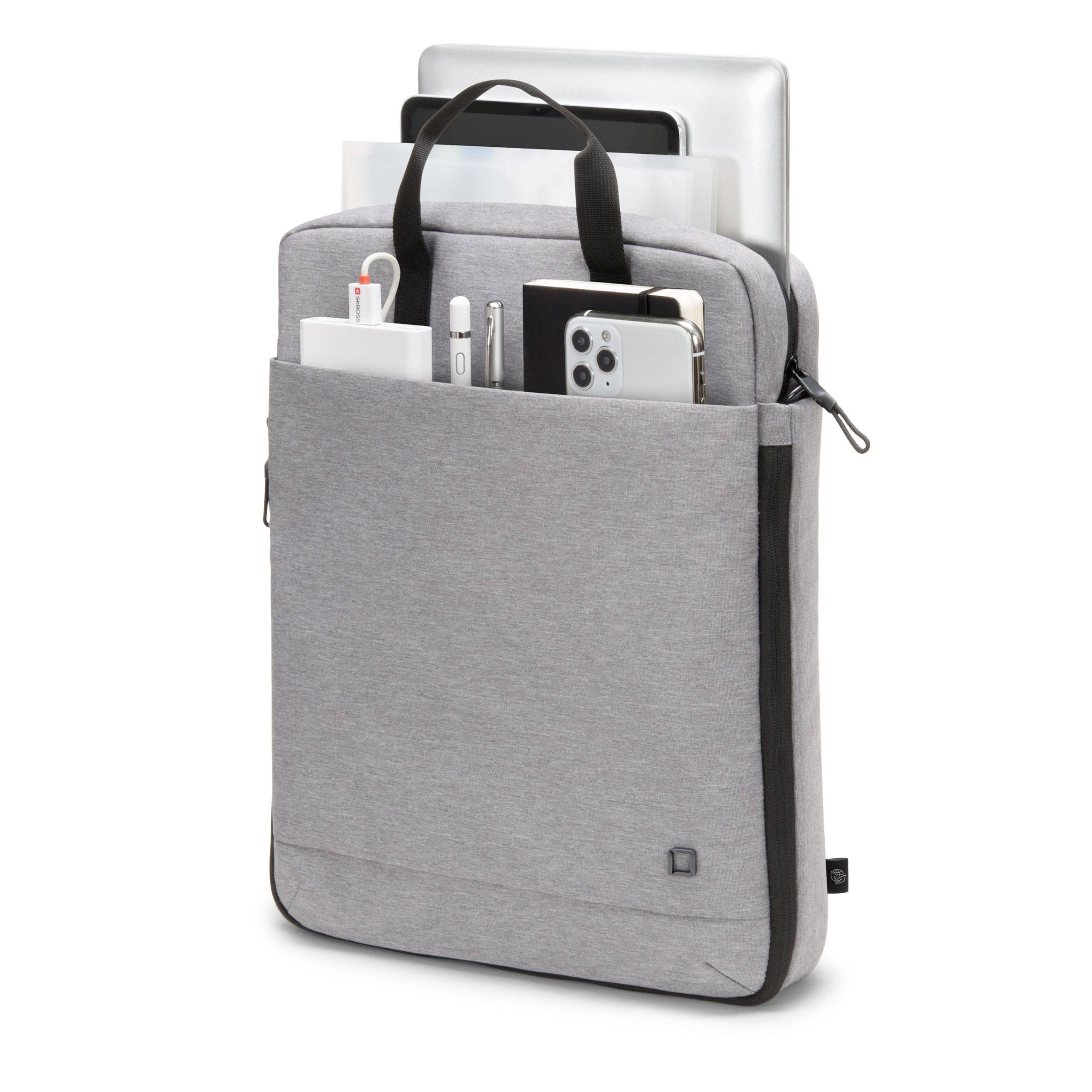 Šedá taška na notebook s několika přihrádkami pojme notebook, smartphone, pera a poznámkové bloky. Je moderní a dobře organizovaná.