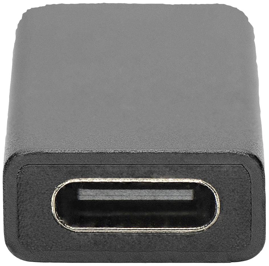 Adaptér USB-C konektoru v detailním záběru, obdélníkový tvar se zaoblenými rohy.