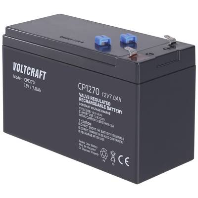 Černá, obdélníková 12V/7.0Ah baterie Voltcraft s modrými a červenými svorkami nahoře a bílým značením na straně.