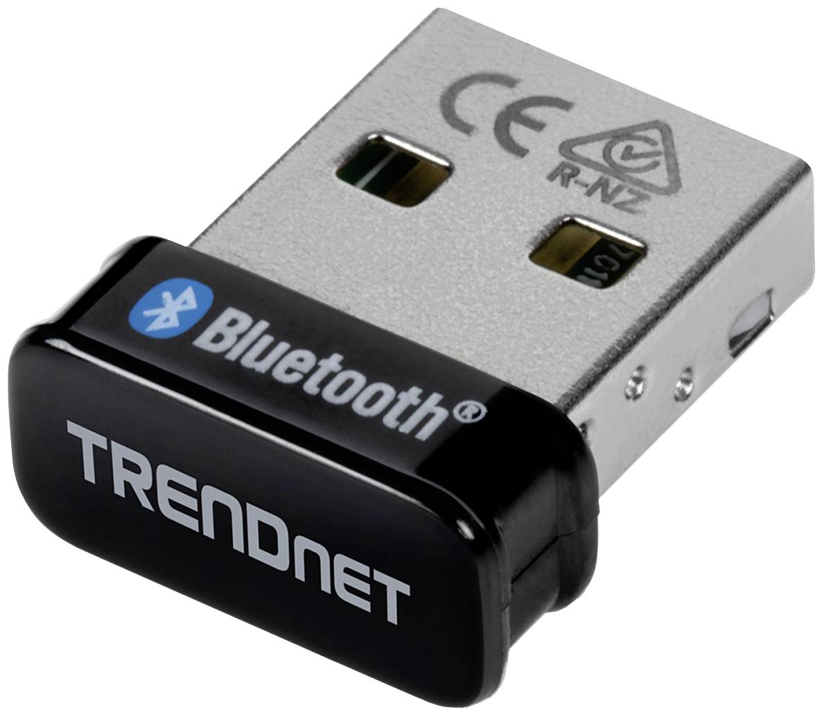 Malý USB Bluetooth adaptér od společnosti TRENDnet, v černé a stříbrné barvě, určený pro bezdrátové připojení zařízení pomocí Bluetooth.