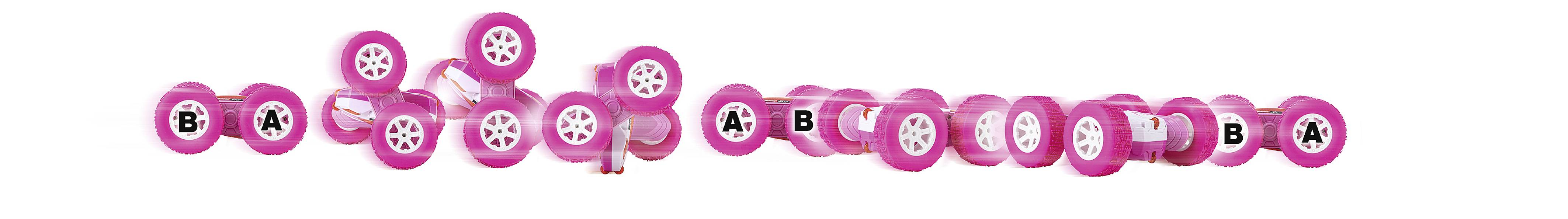 Několik růžových discgolfových disků s bílým vzorem a černými písmeny 'A' a 'B' uspořádaných v řadě.