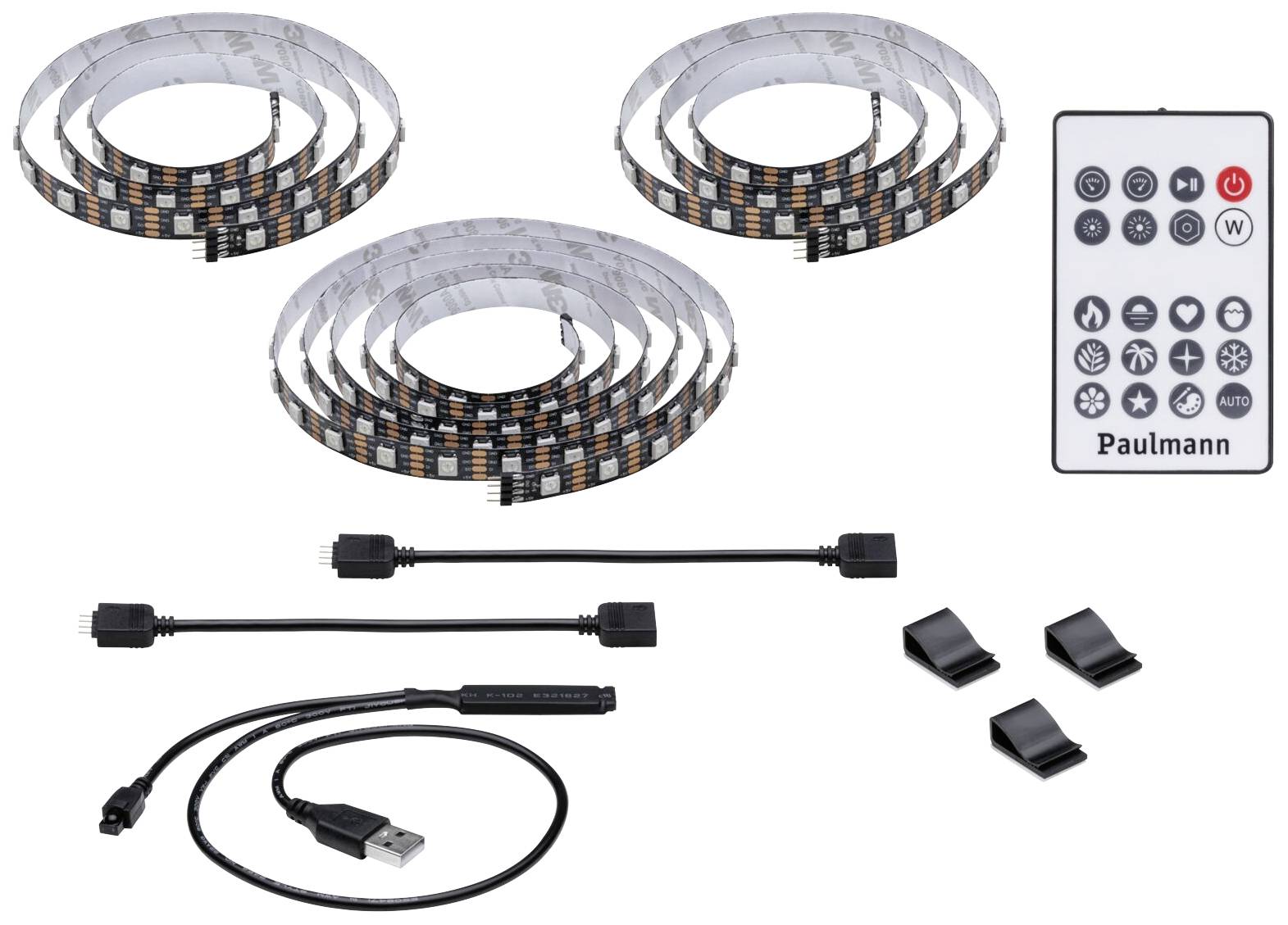 Sada LED pásků skládající se ze tří světelných proužků, dálkového ovladače, USB kabelu a svorek, vhodná pro flexibilní osvětlení interiérů.