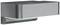 Kovová venkovní nástěnná lampa v moderním designu, tmavě šedá se zaoblenými rohy. Osvětluje prostor směrem dolů.