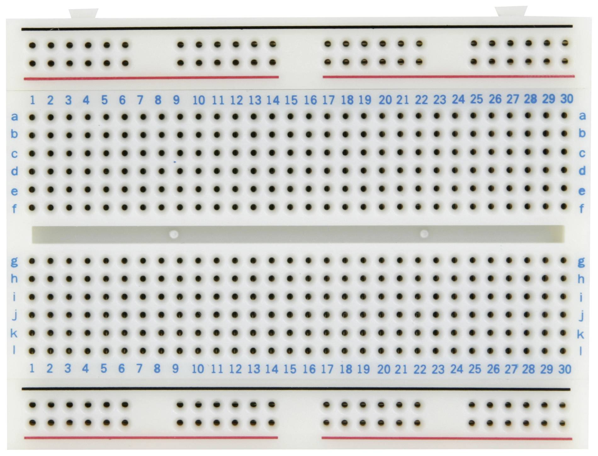 Obrázek ukazuje pájecí desku s numerickými a abecedními značkami, která se používá pro montáž elektronických obvodů.