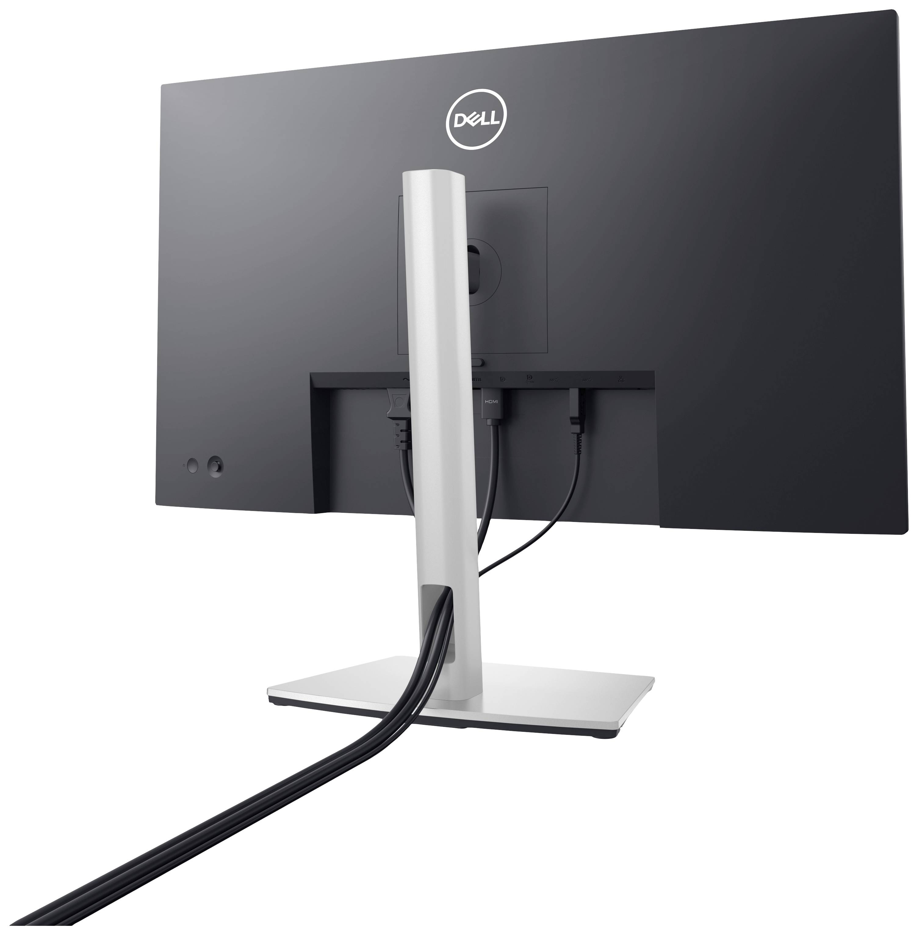 Stolní monitor zezadu s několika připojenými kabely, namontovaný na stole.