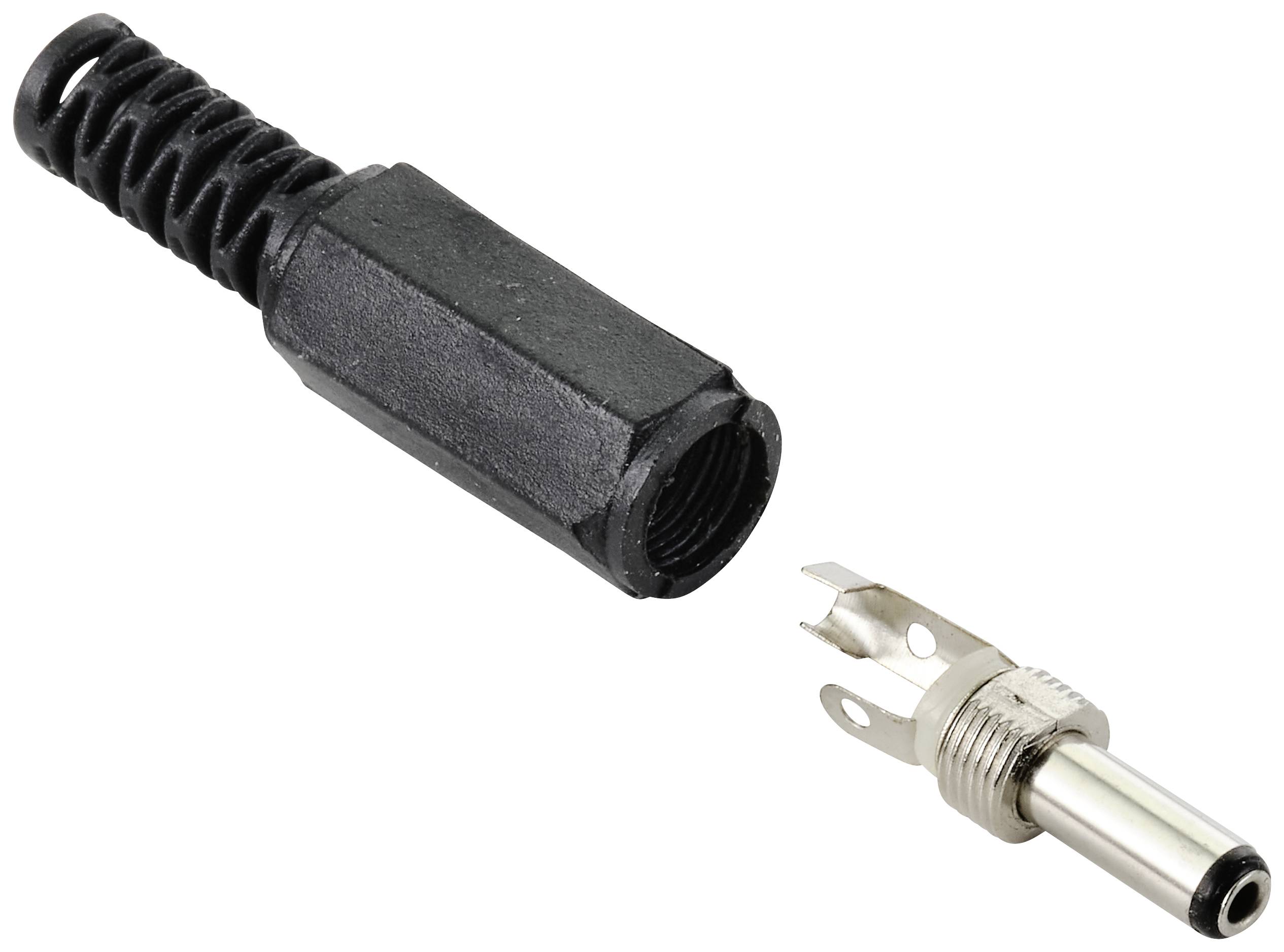 Černý plastový kryt a stříbrný kovový konektor leží vedle sebe, součásti elektrické konektorové sady.