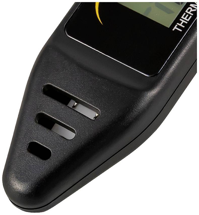 Černé digitální zařízení s větracími otvory dole, pravděpodobně teploměr nebo vlhkoměr.