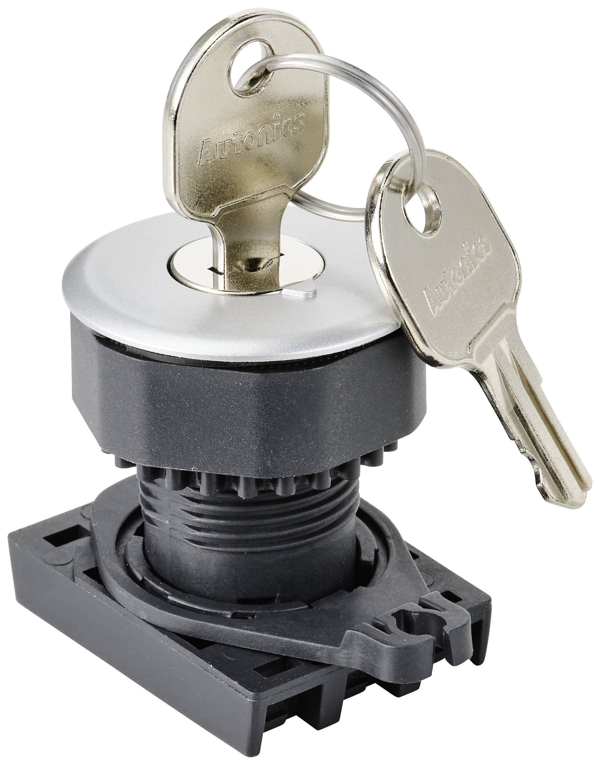 Klíčový spínač se dvěma klíči orientovanými v různých směrech.