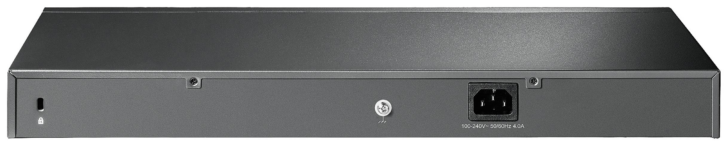 Pohled zezadu na černé elektronické zařízení s síťovým připojením a montážním otvorem pro šroub, pravděpodobně síťový switch nebo router.