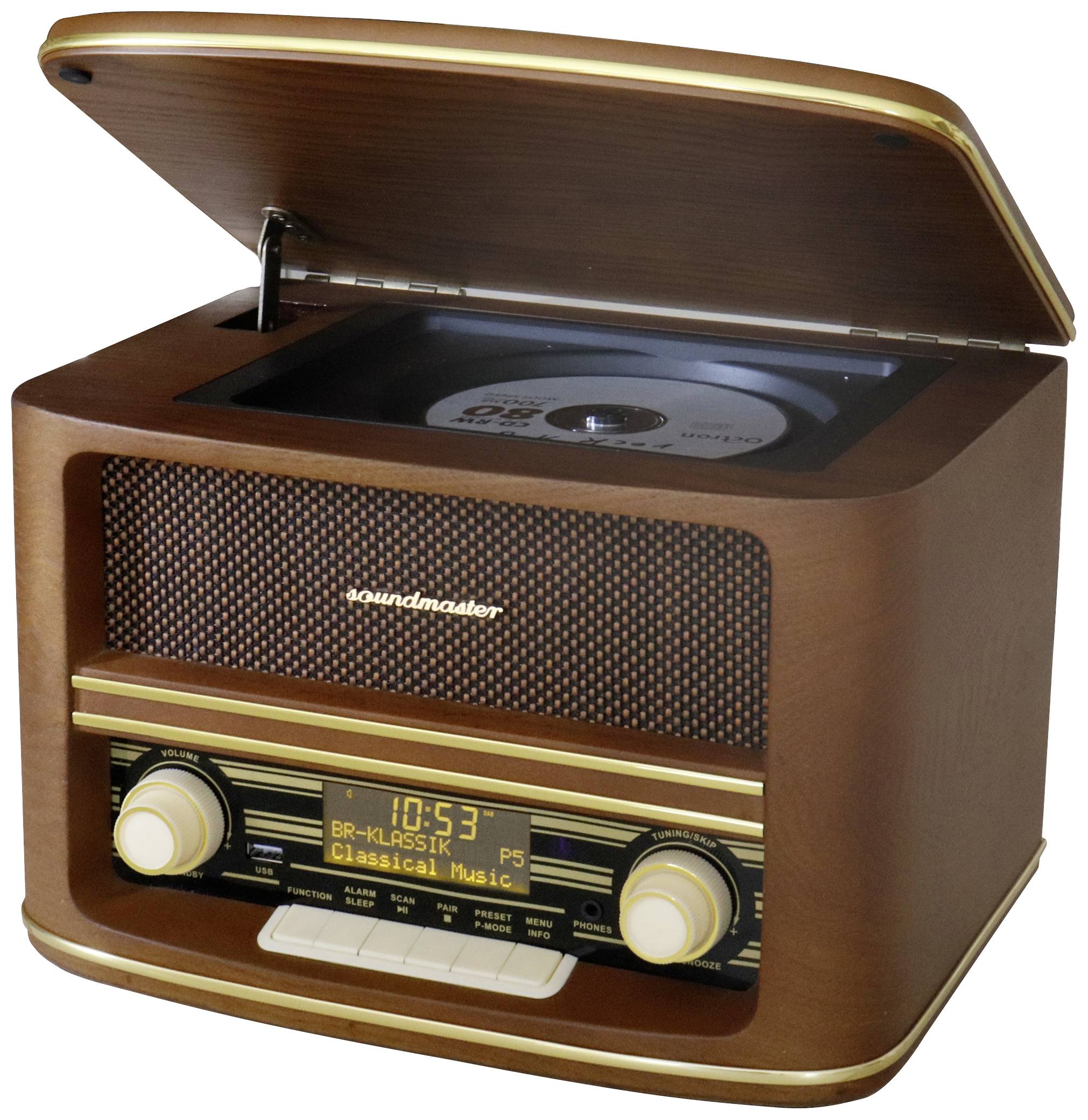 Otevřené retro rádio s CD přehrávačem. Na displeji svítí nápis 'Klasická hudba'. Dřevěná skříňka v retro designu se zlatými ovládacími knoflíky.